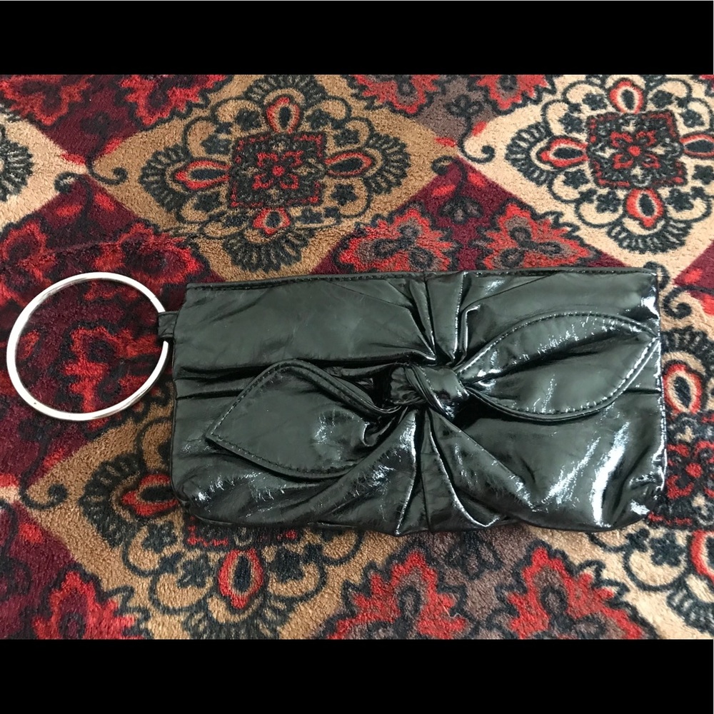 Black wristlet with metal ring